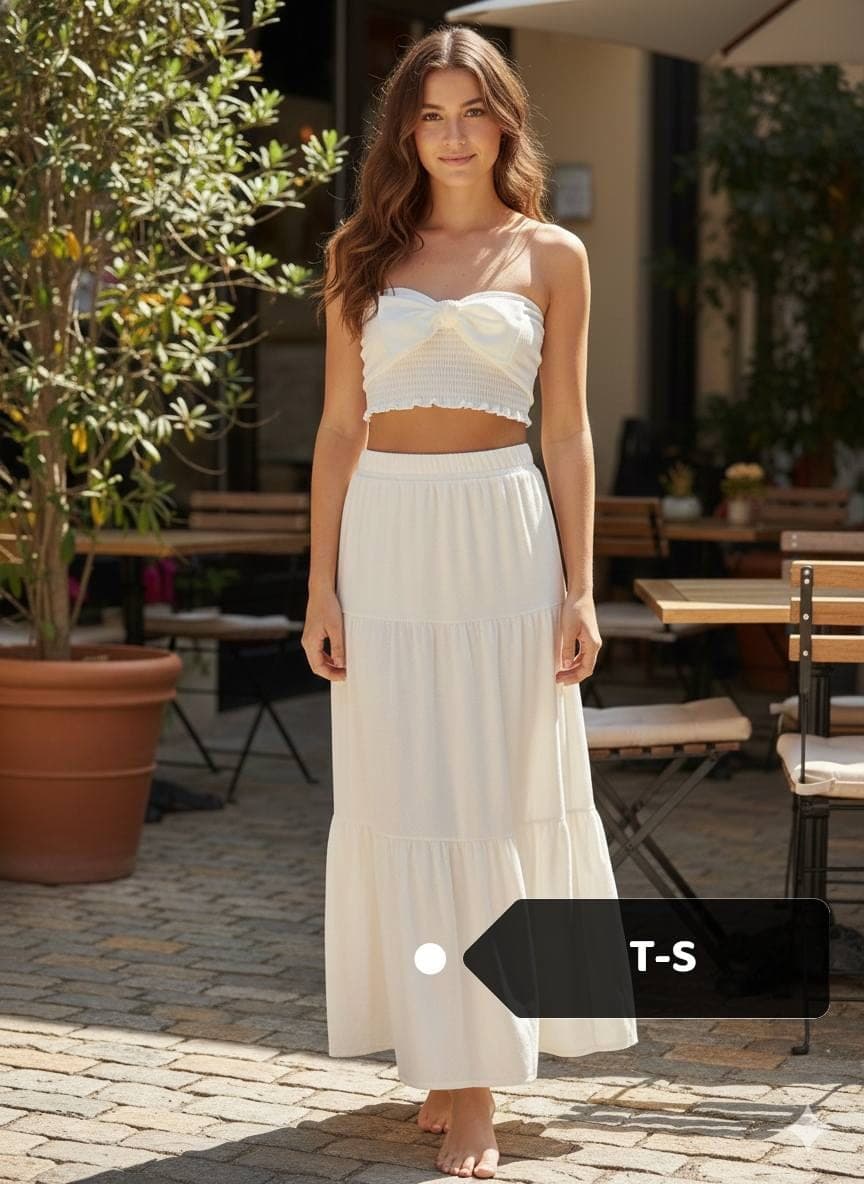 Conjunto top con moño y falda larga escalonada